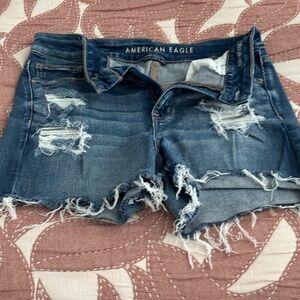 American Eagle Outfitters Ripped Blue Jean Shorts stretch,little used, good..